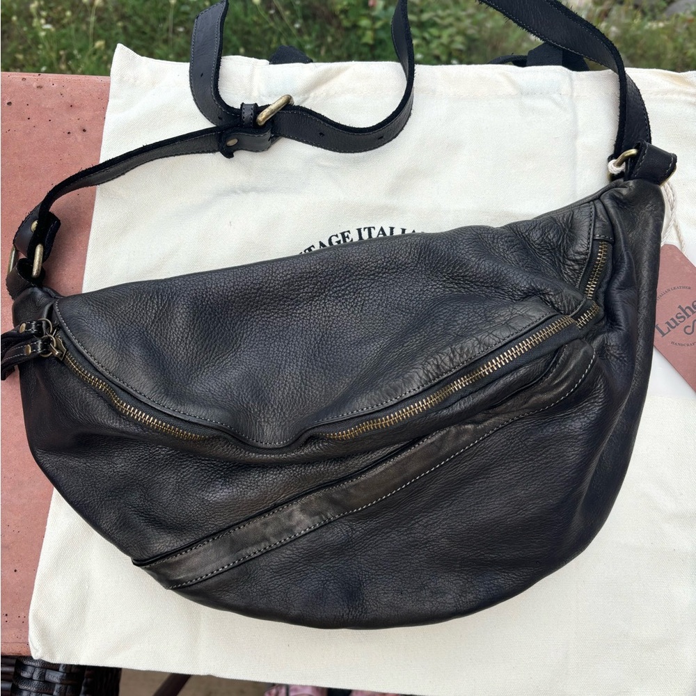 Lusher urban leather sling in bottle green